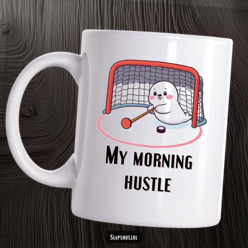 Funny seal character intensely shooting a hockey puck towards a net on a mug, perfect for sports fans.