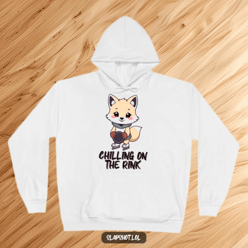 Funny arctic fox hoodie featuring a cheerful character in ice skates, ready to play hockey, offering warmth and humor.