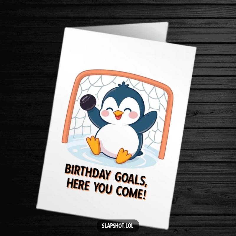 Funny Free Printable Birthday Card: A giggling penguin slides into a net with a puck, celebrating a birthday goal.